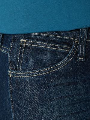 Women's Wrangler® FR Flame Resistant Mid-Rise Bootcut Jean in Rinse Wash