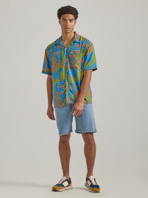 Free Photo  View of hawaiian shirt with pants and sneakers