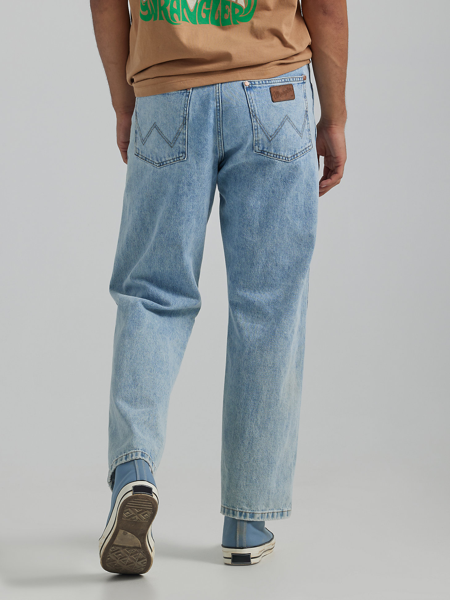 Men's Wrangler® Heritage Redding Loose Fit Jean in Ripped Light Wash alternative view 1