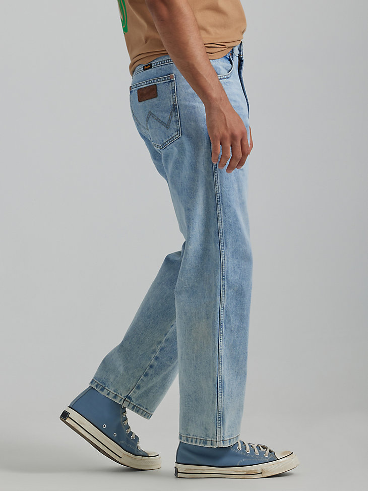 Men's Wrangler® Heritage Redding Loose Fit Jean in Ripped Light Wash alternative view 4