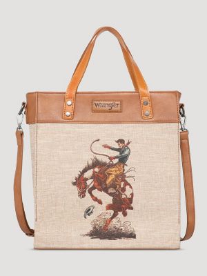 Man Riding Bucking Horse In Rodeo Weekender Tote Bag by Stockbyte