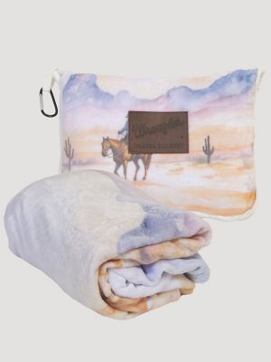 Wrangler Travel Blanket in Cowboy Sunrise