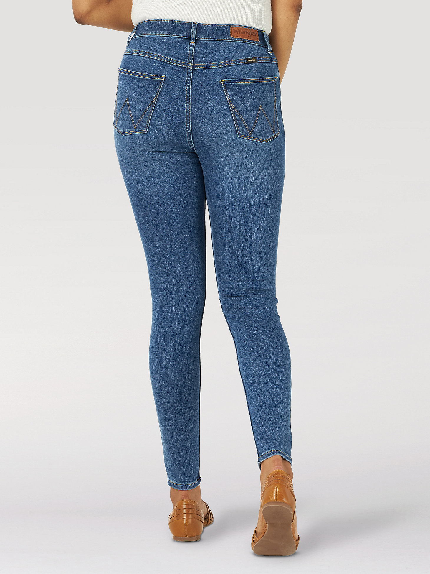 Women's Wrangler® High Rise Unforgettable Skinny Jeans in Cloud alternative view 1